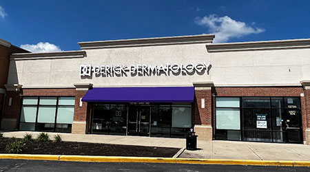 Derick Dermatology office front at the Plainfield location, with a small purple awning